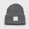 Fashion Men Knitted Beanie For Woman Designer Solid color flanging Skull Caps Warm Winter unisex hat 21 Color