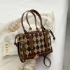 Advanced Lingge Handbag Women's Autumn and Winter 2022 New Fashion Messenger Borsa a tracolla in tela