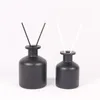 50ml 100ml 150ml 200ml wholesale round empty matte black reed glass aroma diffuser bottle with stopper