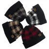 New style ladies plaid ponytail woolen CC cap, fashionable European and American curled edge warm knitting warm earmuff head hat