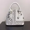 أزياء المرأة قذيفة المحافظ وحقائب اليد لفتاة الجلود الصينية نمط القومي زهرة حقائب crossbody الوالدين والطفل رسول حقيبة