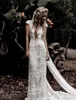 Boho Abito da sposa a sirena in pizzo all'uncinetto Manica corta Abiti da sposa lunghi country senza schienale sexy Abiti da sposa vintage da spiaggia bohémien Stile rustico Realizzato su misura