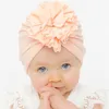 12 colori Cappelli per bambini Cute Girl Boy Knot Indian Big Flower Turban Copricapo Cap Kids Head Wrap Solid Soft Headwrap Cotone a costine Infantile Fascia per capelli Beanie