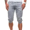 Мужские брюки мужские тренажерный зал Летние шорты бегуны бегущие карманные кружева HLAF эластичные талии повседневные спортивные штаны