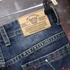 Jeans pour hommes 2021 Marque d'été Vêtements Tendance Mode Short en denim droit Poches classiques Trou déchiré Peinture Imprimer Jeunesse Coton