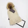 2021 Wysokiej jakości gruby ciepły zimowy kapelusz na damski miękki kabel rozciągający tkanin Pompon Cap Women Skullcap Little Girl Caps2203801