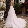 Vôios de casamento de ilusão V-decote A linha Tulle Sexy Lace Appliques Sash Bodice Voltar Ver através do vestido de noiva rosa