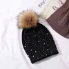 Cntang kvinnor dekorera pärla mössor vinter varm ull stickade hattar naturlig tvättbjörn päls pompom cap mode casual damer hatt 211229