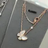 Fjäril vit skal hänge halsband kvinnlig silver lyxig design 18k guld pläterad enkel temperament kassakedjans halsband 7663010