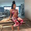 Kvinnors Jumpsuits Rompers 2021 Ärmlös Sexig För Kvinnor Tie-Dye Skriv ut Deep V-Neck Bodycon Bandage Mujer Body Suit Streetwear Outfits