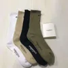 Basketball Skateboard High Tube Sports Socks Socks Double Line Mode marque pure couleur serviette en bas de bott