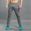 Jesienne spodnie męskie wysokie elastyczne sznurek 2021 Bieganie trainning spodnie joggers Zipper kieszonkowe spodnie dresowe S-3XL mężczyźni
