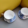 Keramiska Retro Cups Saucer Set Porcelana Phnom Penh Asymmetrisk Blå och Vit Porslin Teacup Kaffe eftermiddag Teaset