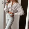 Casual Bandage Shirts Lapel Sexiga Långärmade Kvinnor Blusar Knapp Fashion Night Club Crop Tops Lady Spring 210414