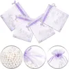 100 pcs / lote organza sacos com cordão para anéis brincos saco de casamento chuveiro de bebê aniversário pacote de presente de Natal