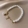 Classic Fashion Butterfly Pearl Pendant Armband för kvinnor Utsökt Lucky Manschett Bracelet Anniversary Gift Luxury Smycken Ny