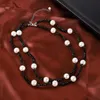 Łańcuchy Moda Dwuwarstwowa Pearl Naszyjnik Czarno-białe Koraliki Biżuteria Dla Kobiet Party Prom Dopasowanie Akcesoria