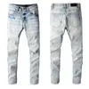 male designer to make old motorcycle riding men's jeans with holes in the knees, letter appliques hot rhinestones high quality hip hop slim-fit jeans