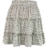 Kjolar blommor tryck boho bomull sexig mini kjol veckade ruffles midiskirt bandage mode hög midja frill snörning strand kort