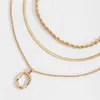 Geometrische elliptische ring hanger kettingen multi-lagen legering gouden slang ketting vrouwen rok jurk twist ketting ornamenten accessoires