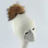 Cappello da donna in lana invernale da donna Streetwear Protezione per le orecchie calda Skullies Berretti Vera pelliccia di procione Pompon Cappelli lavorati a maglia 211119