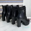 Bottes noires à plateforme épaisse pour femmes, style punk, boucle de moto, chaussures imperméables en cuir à talons hauts