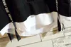 メンズTシャツサマーハイストリートウェアヒップホップポロシャツ学生日本語ハラジュクリボンパッチワーク偽リボン2ピースレター印刷TシャツメンS-2xl