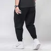 été hommes grandes ventes pantalons de survêtement sport pantalon respirant pas cher plus la taille 7XL 8XL pantalon décontracté mince élasticité pantalon extensible noir Y0811