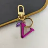 Porte-clés de luxe à la mode en cuir véritable corde classique porte-clés bloc de couleur lettre clés boucle hommes femmes sac pendentif214V