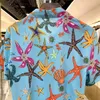 Mäns Casual Shirts 2022 Sommar Fashion Starfish Printed Shirt Trend Brand Party Cardigan Street Lapel Short Sleeve