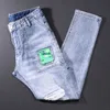 أزياء الشارع الشهير الرجال الجينز الرجعية الضوء الأزرق يتأهل انفجرت مرونة القطن بقع جيب مصمم الهيب هوب الدينيم السراويل 1A4Q