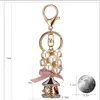 Chaveiros Lanyards Chaveiros Bonito Chaveiro Pérola Cristal String Carrossel Para Mulheres Chaveiro Jóias Presente Acessórios Llaveros Para Mujer Drop Ship Miri22