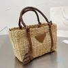 Lyxig designer Kvinnor Kvinnor Väskor Mode Twine Straw Tote Bag Shopping Handväskor Klassisk Triangulär Lady Sunshine Knitting Beach