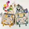 Filles coréenne belle adolescente multifonctionnelle Portable vache voyage petits sacs d'école mignons Badge sacs à dos