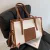 حقائب الكتف منقوشة ذات سعة كبيرة مطابقة اللون 2021 الصيف الملمس حقيبة يد نسائية بسيطة محمولة