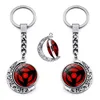 Sharingan Eye Portachiavi Accessori Ciondolo Luna rotante a 360 gradi Uchiha Sasuke Kakashi Portachiavi Anime Charms Portachiavi in metallo G1019