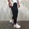 Pantaloni da jogging incrociati da uomo Hip Hop Streetwear Pantaloni da pista alla moda casual Pantaloni da tuta comodi solidi da uomo Pantaloni larghi da uomo