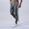 Męskie spodnie z boku pasiastki dresowe mężczyźni joggers bawełniany trening na siłownię trening fitness