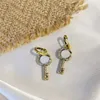 Volledige kristallen ontwerper oorbellen charm persoonlijkheid sleutel vorm studs vrouwen diamant hanger oorbel meisje sieraden met geschenkdoos