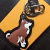 Fashion Chai Dog Keychains Luxury Designer Leather Key Chain Laser präglade väskhängen med Box202y