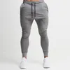 Neue Fitness Jogger Hosen Männer Gym Hosen Bodybuilding Kleidung Baumwolle Jogginghose Bleistift Hosen Männer Workout Schweiß Hosen 210421