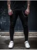 Jeans skinny a righe casual alla moda da uomo Pantaloni a matita slim fit elasticizzati Jogger Hip Hop Streetwear Pantaloni da uomo in denim nero Harem