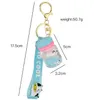 Chat flottant macaron sables mouvants porte-clés surf chat bouteille à la dérive pendentif voiture sac à main porte-clés sac anneau pour fille et femme cadeau bijoux accessoires