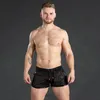 Ny gym Mens Sport Running Shorts Male Snabbtorkande Andningsbar Sexig Strand Utomhus Fritid Fitness Training Pants X0316