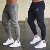 Men's quality Brand Men pants Fitness Casual Elastic Pants bodybuilding clothing casual gym workout sweatpants joggers pants Y0927