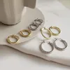 thick silver hoop earrings