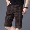 Shan Bao軽量フィッティングストレートファッションショーツサマークラシックブランド青年男性のストレッチチェック柄カジュアル