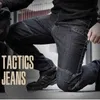 Armée Combat Denim Jeans Hommes Portable Force Spéciale Flexible Militaire Jeans Tactique SWAT Multi Poche Coton Pantalon 210331