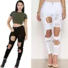 plus size white skinny dżinsy