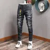 coreano nero di moda i jeans strappati